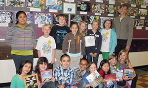 group of students with teacher posing for a photo